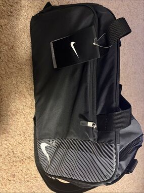 Nike Black Men's Duffel Bag with Subtle Striped Accent